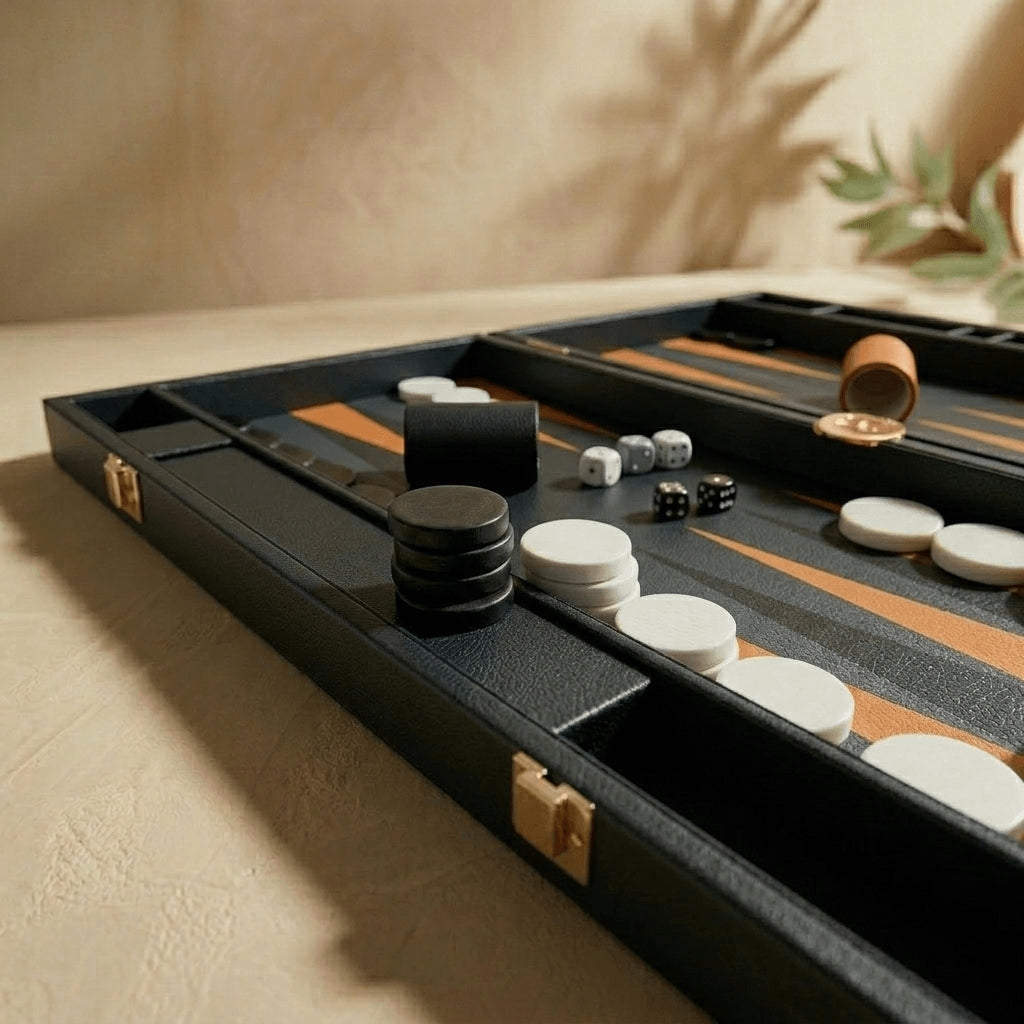 Backgammon set with pieces and dice on a beige surface