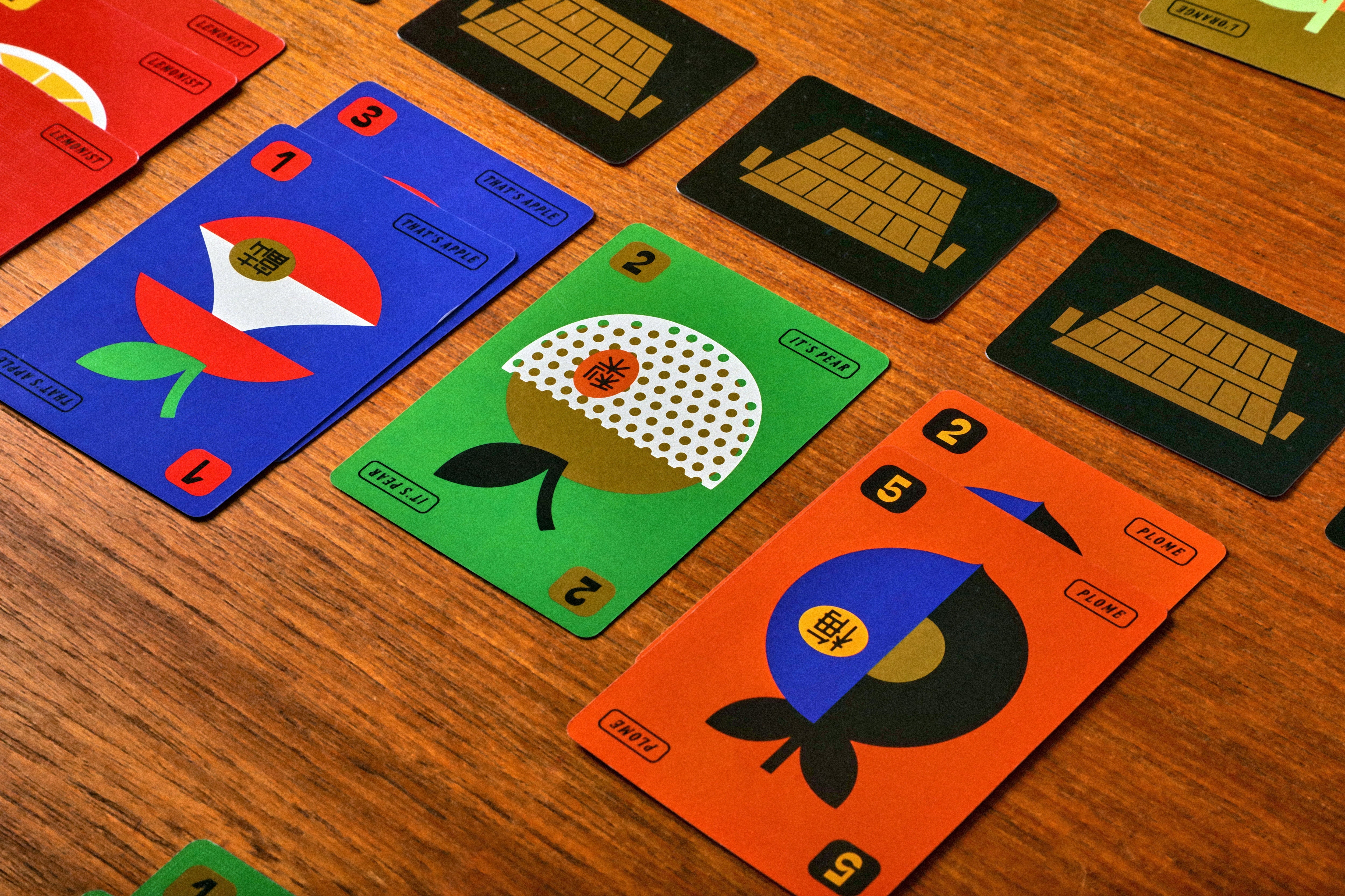 Colorful playing cards on a wooden table