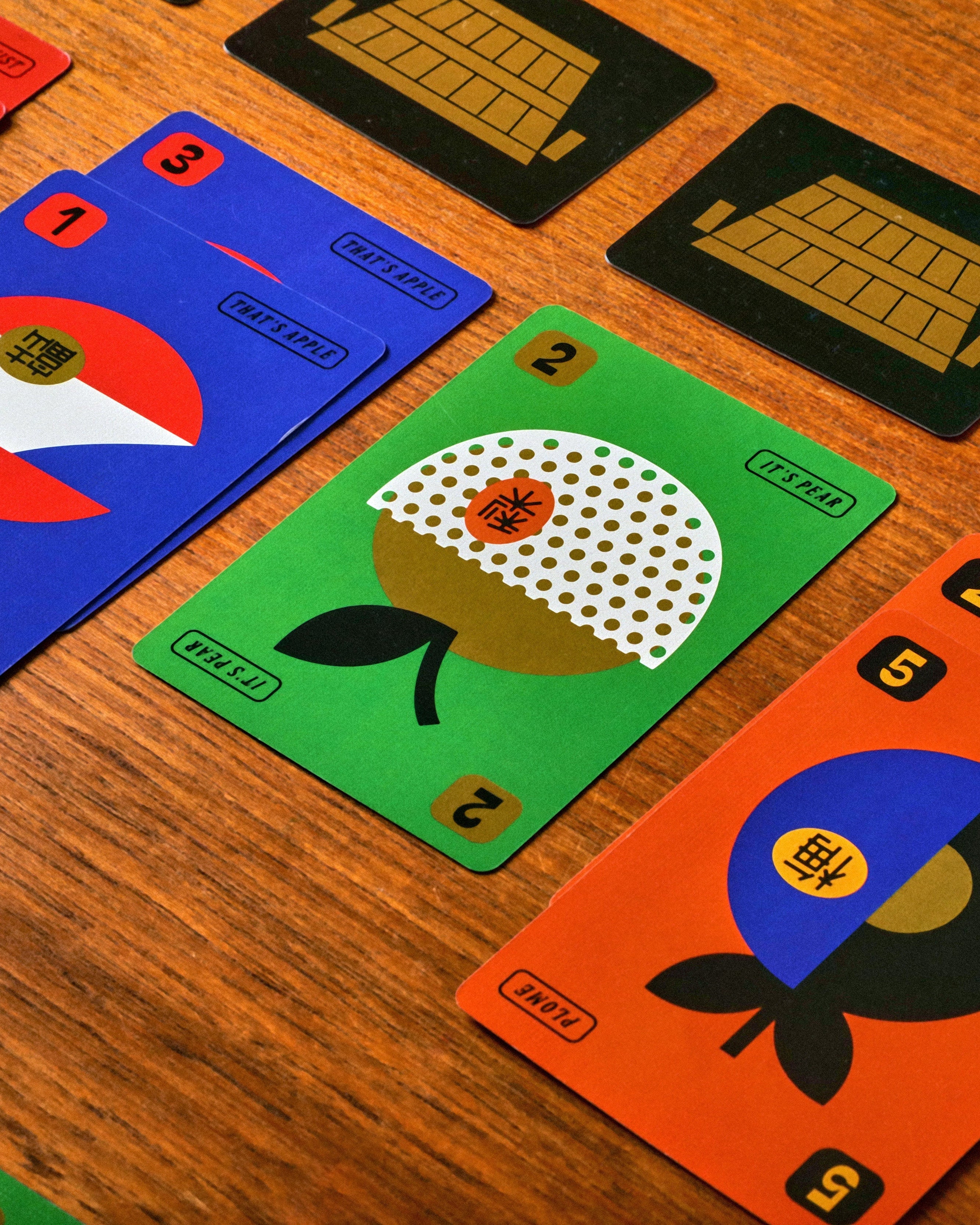 Colorful playing cards on a wooden table