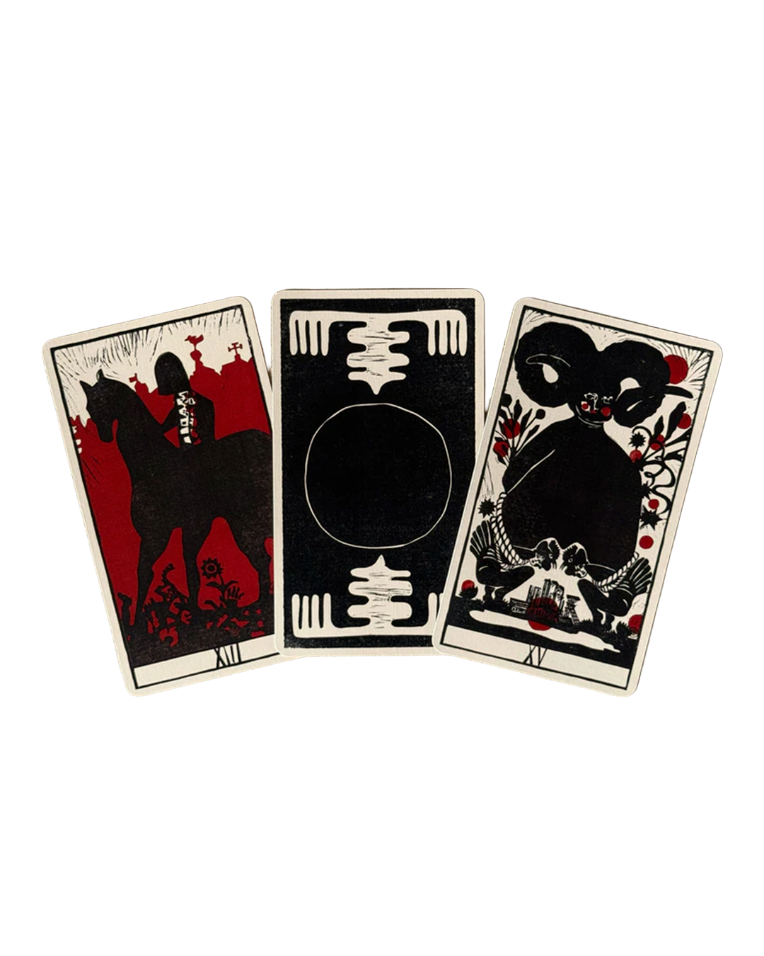 Three playing cards with black, white, and red designs on a white background