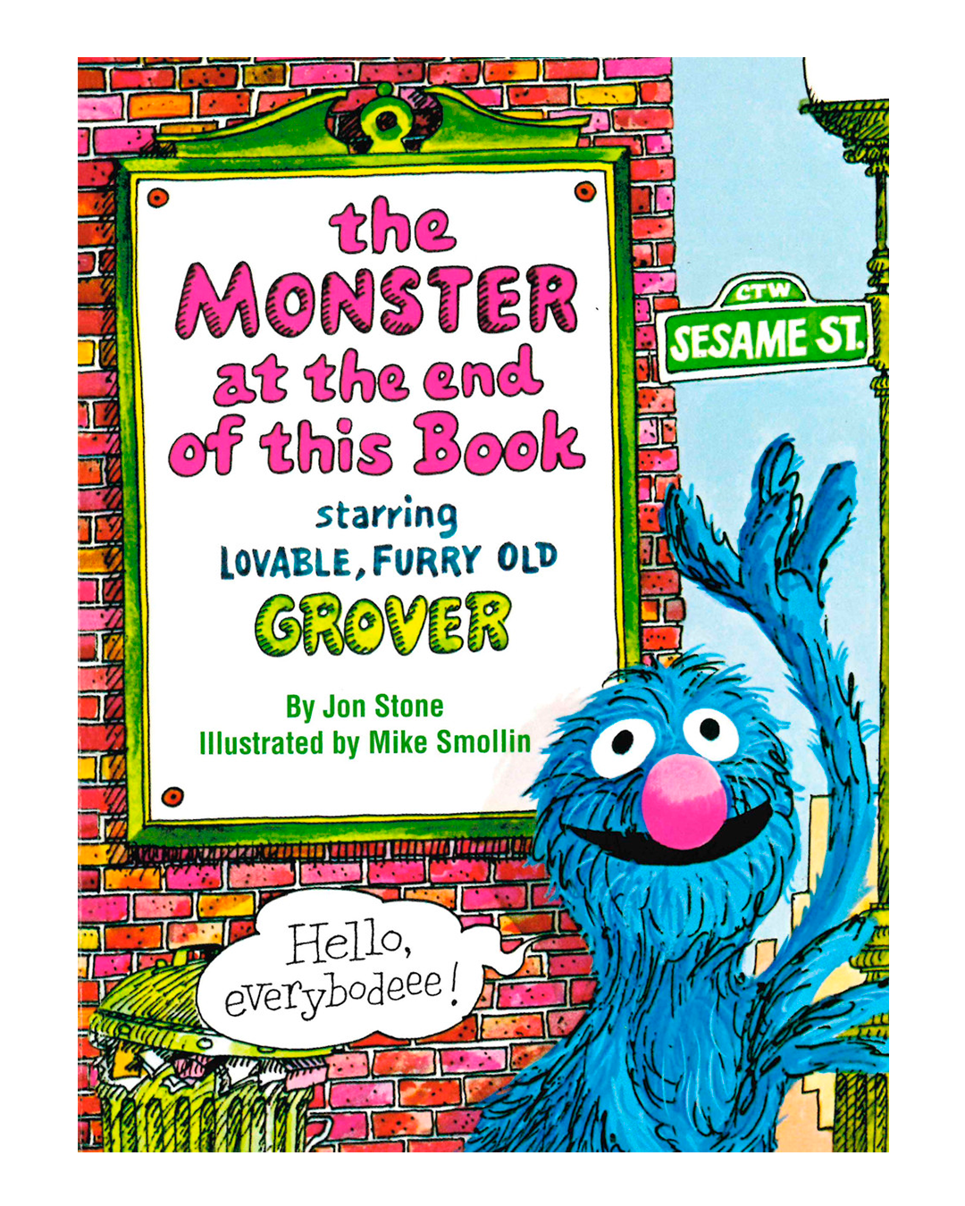 Children's book cover for 'The Monster at the End of This Book' featuring the blue Sesame Street character Grover waving in front of a brick wall and a Sesame Street sign.