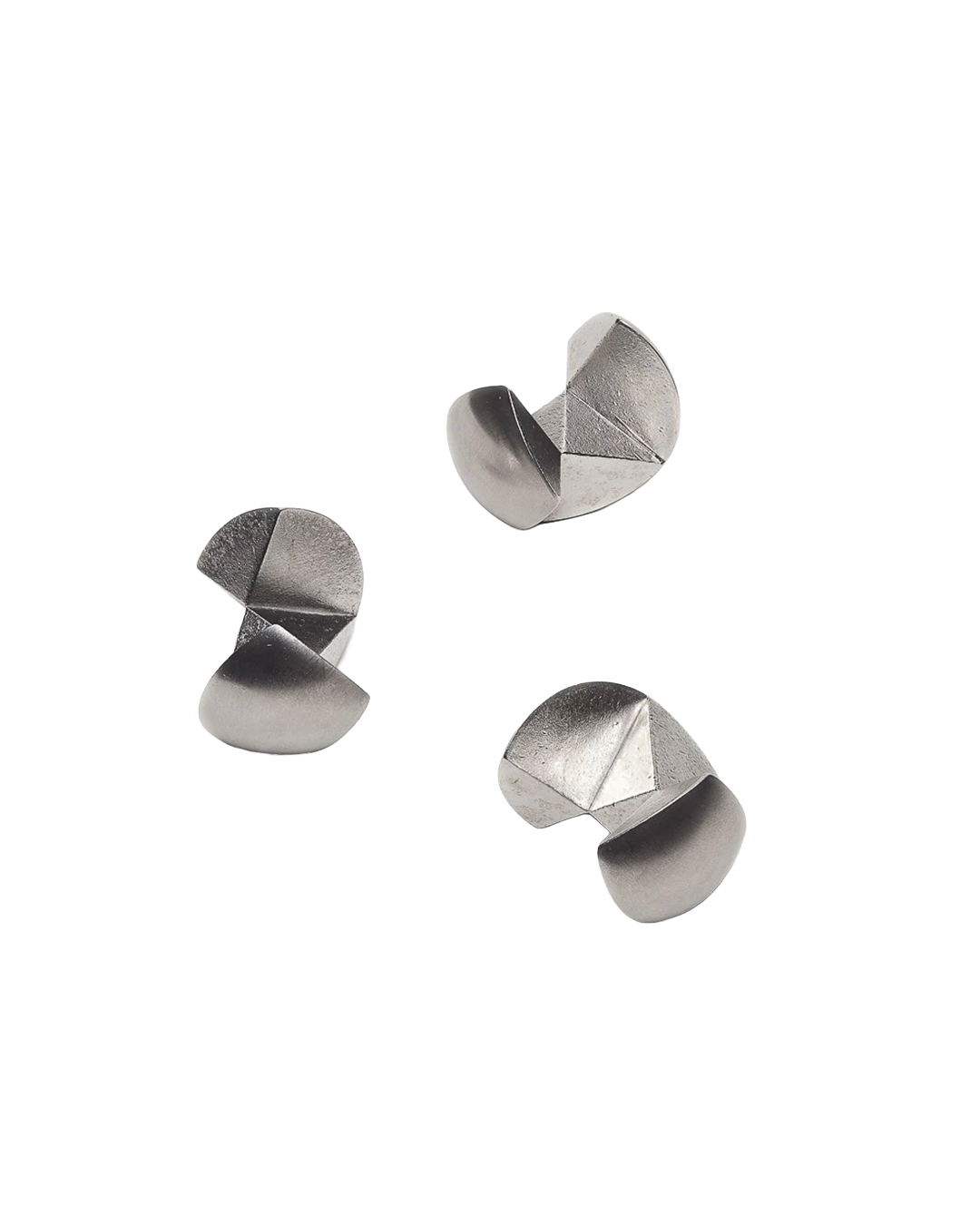 Pair of silver geometric earrings on a white background