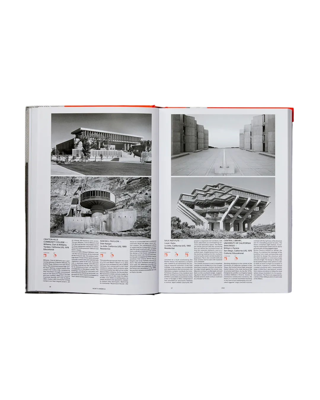An open book showing two printed spread pages with black-and-white architectural photographs and columns of text, photographed against a plain white background.