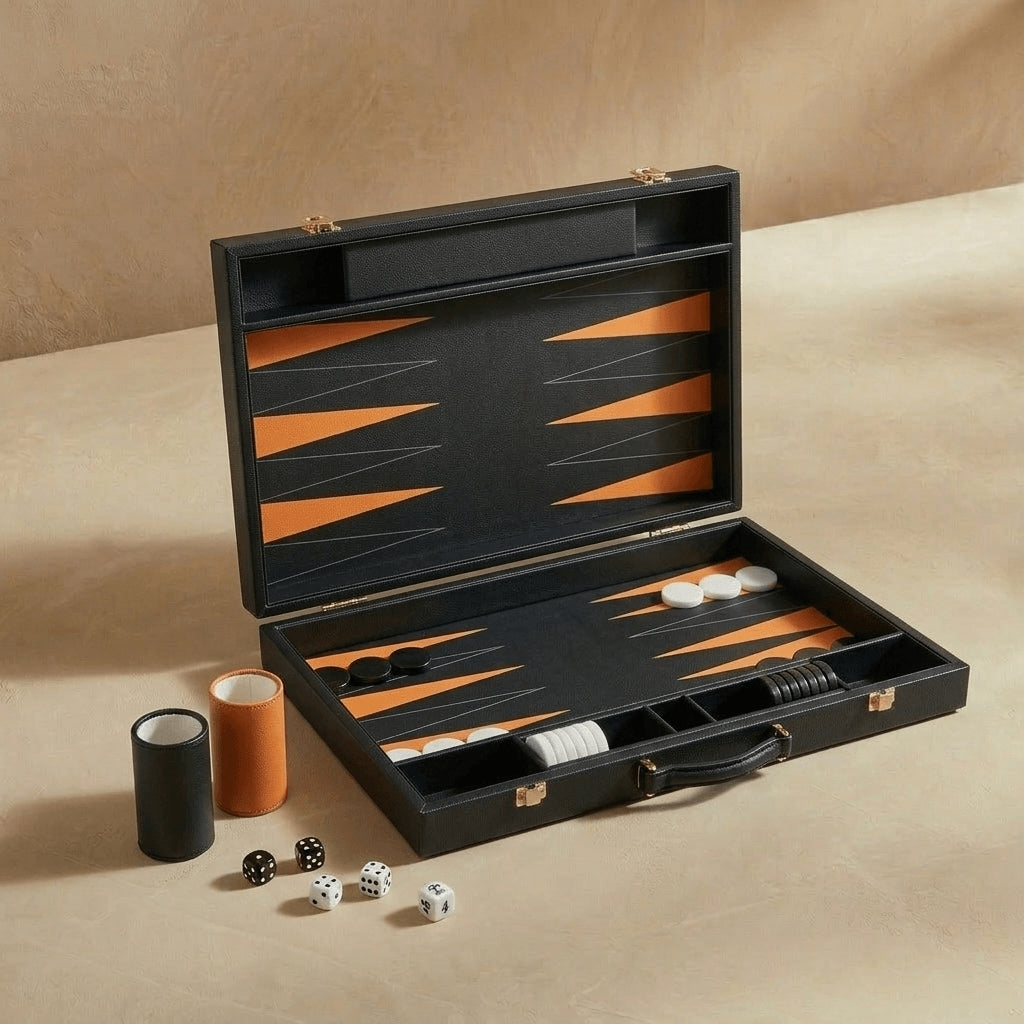 Backgammon set with pieces and dice on a beige surface