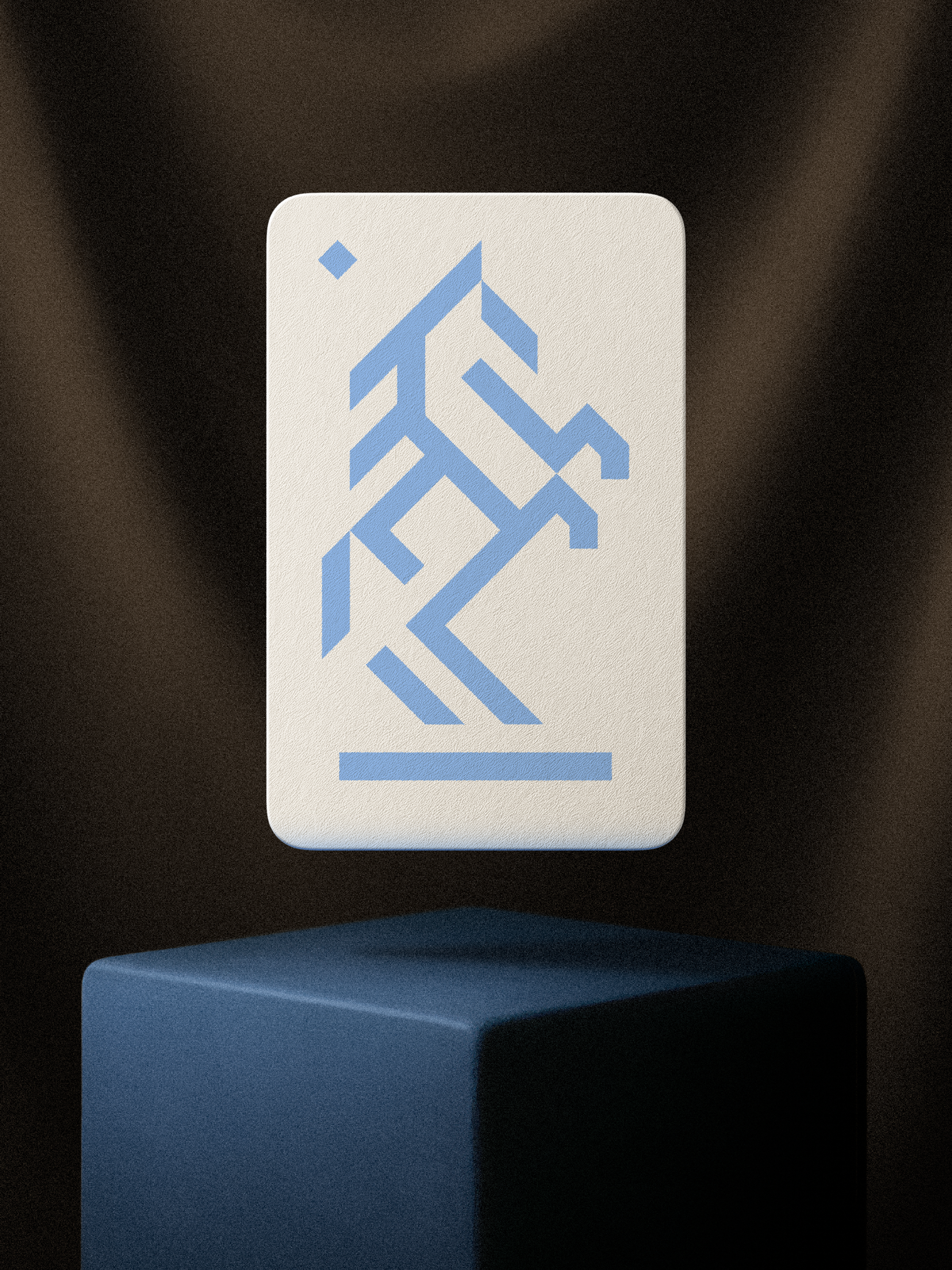 Card with blue geometric design on a dark background