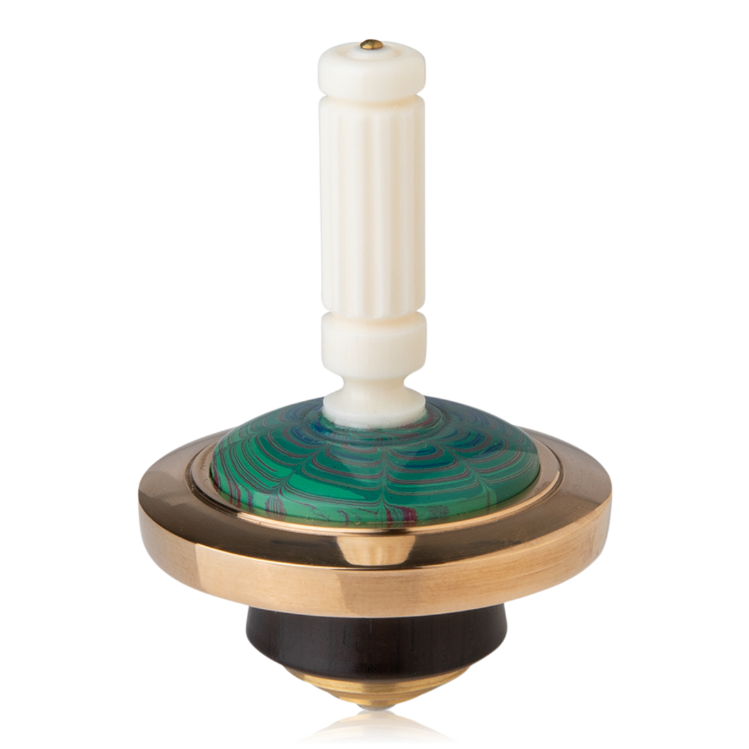 Brass outlet spinning top