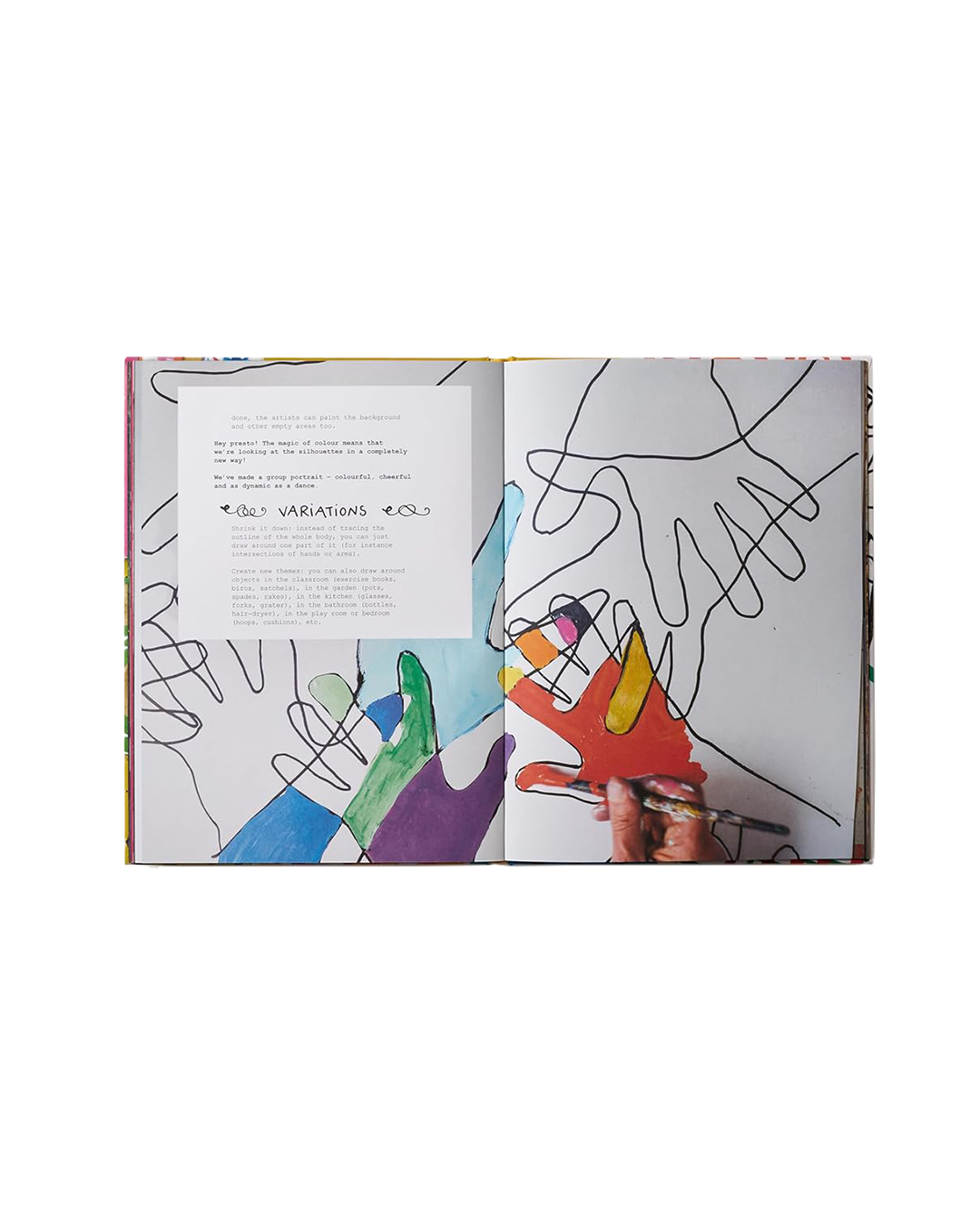 Open book with colorful line art of hands on a white background