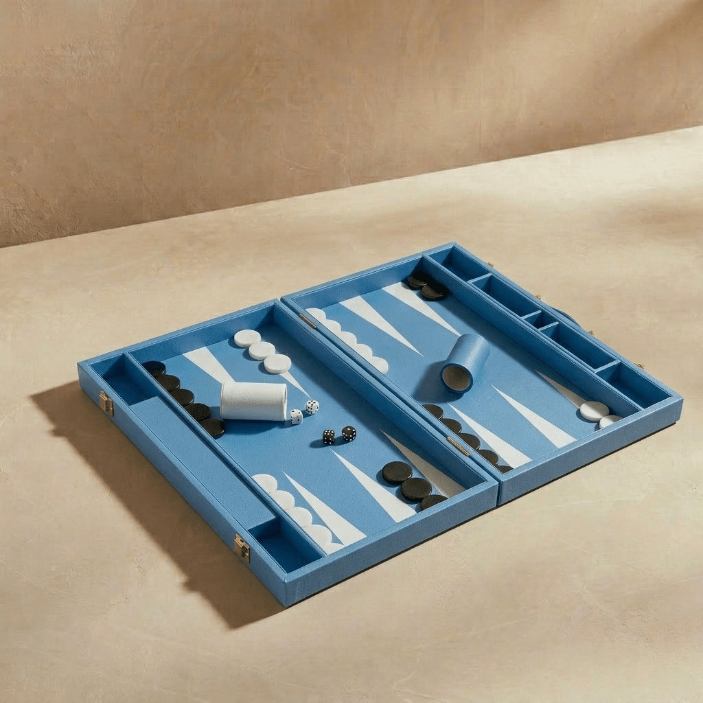 Blue backgammon set on a beige surface