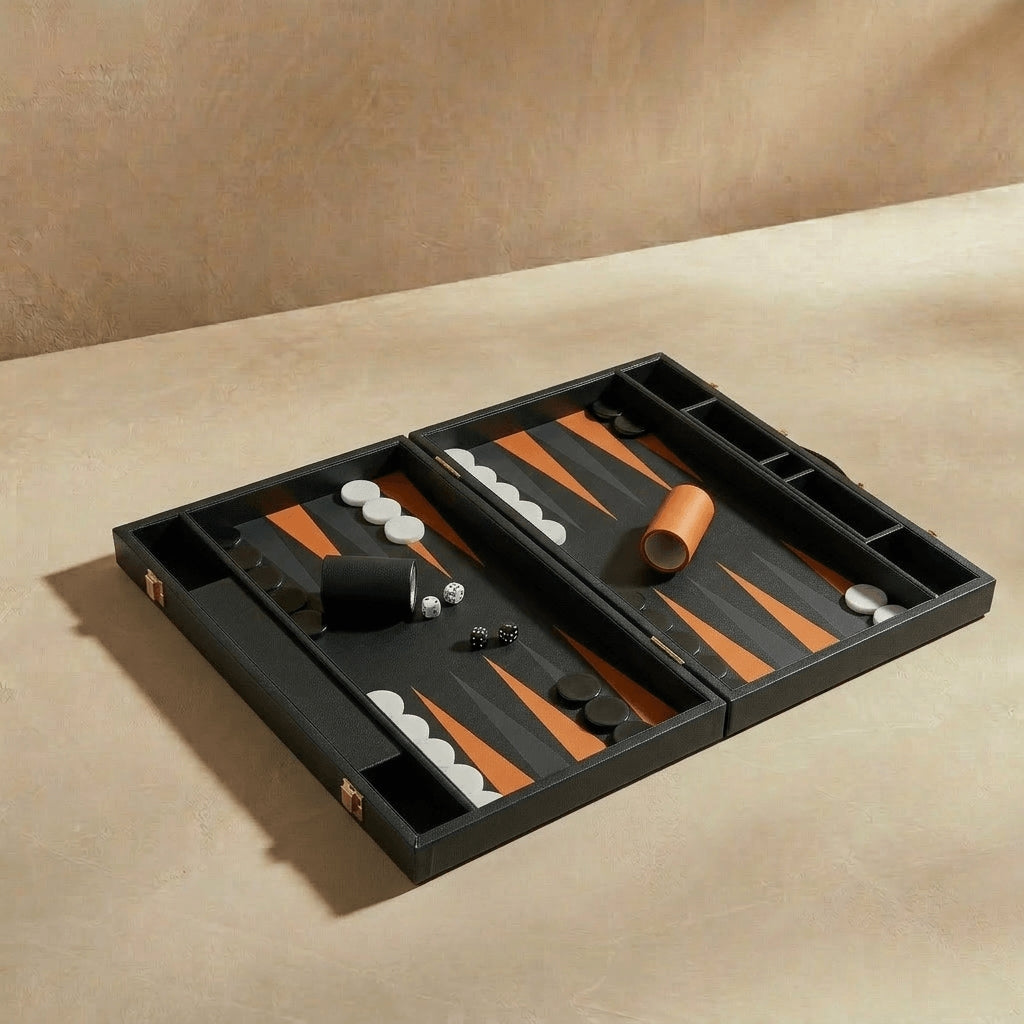 Backgammon set on a beige surface with a neutral background