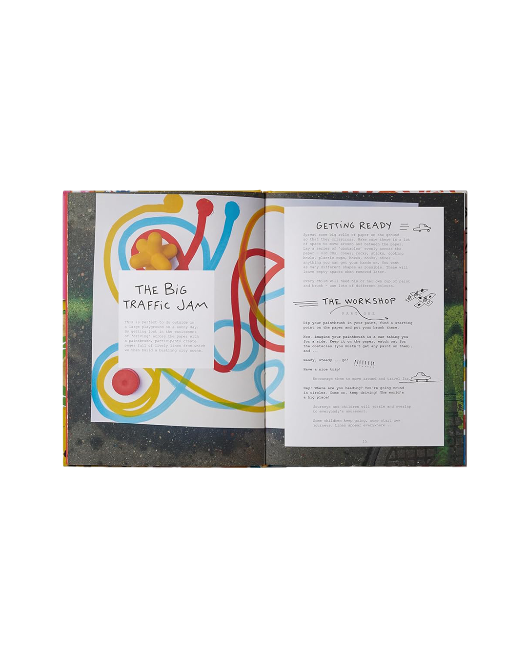 Open book with colorful abstract design on a white background