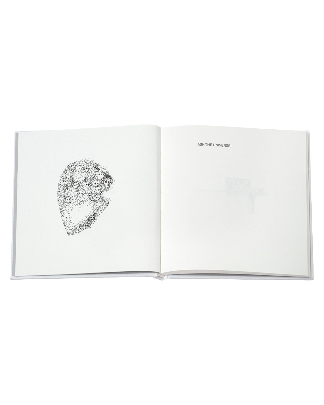 Open book with a black and white illustration of a leaf on a white background