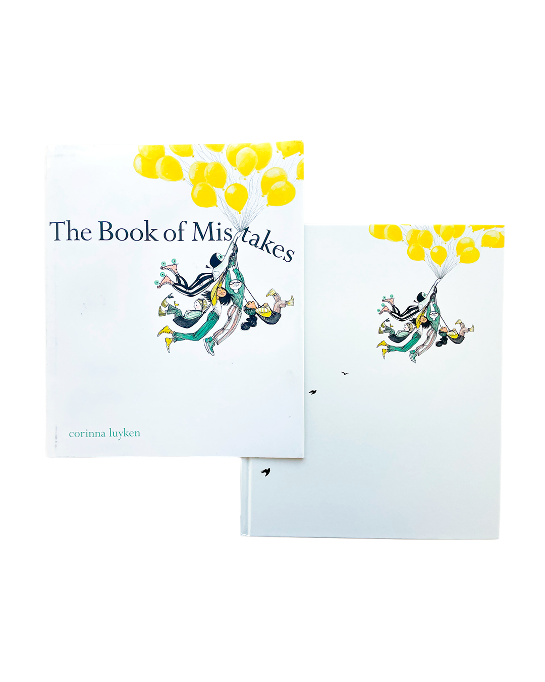 The Book of Mistakes by Corinna Luyken, featuring a white hardcover with a whimsical illustration of children floating upwards with yellow balloons, shown alongside a matching white notebook or card on a clean white background.