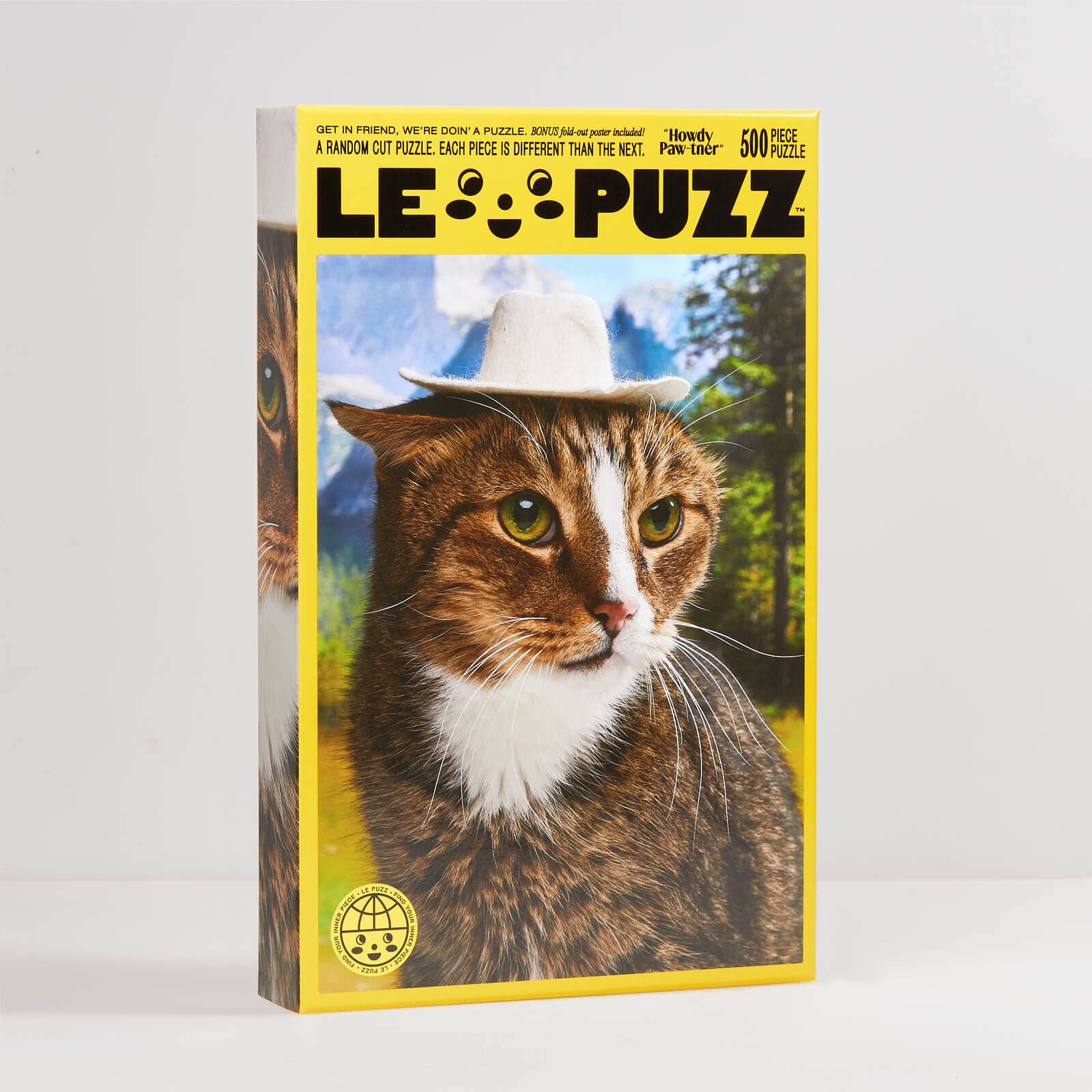 LE PUZZ puzzle box with a cat wearing a cowboy hat on a yellow background