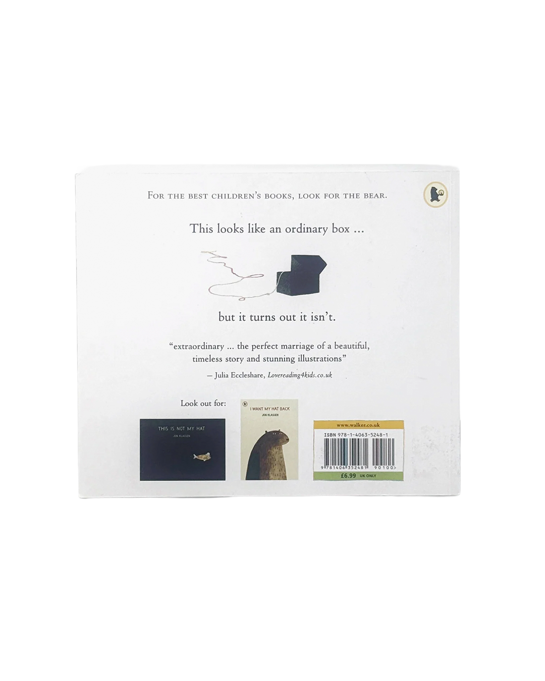 The back cover of a children's book shown against a plain white background. The white cover features black text, a small illustration of a dark blue box with a keyhole, a quote, and a small inset showing a book inside the box.