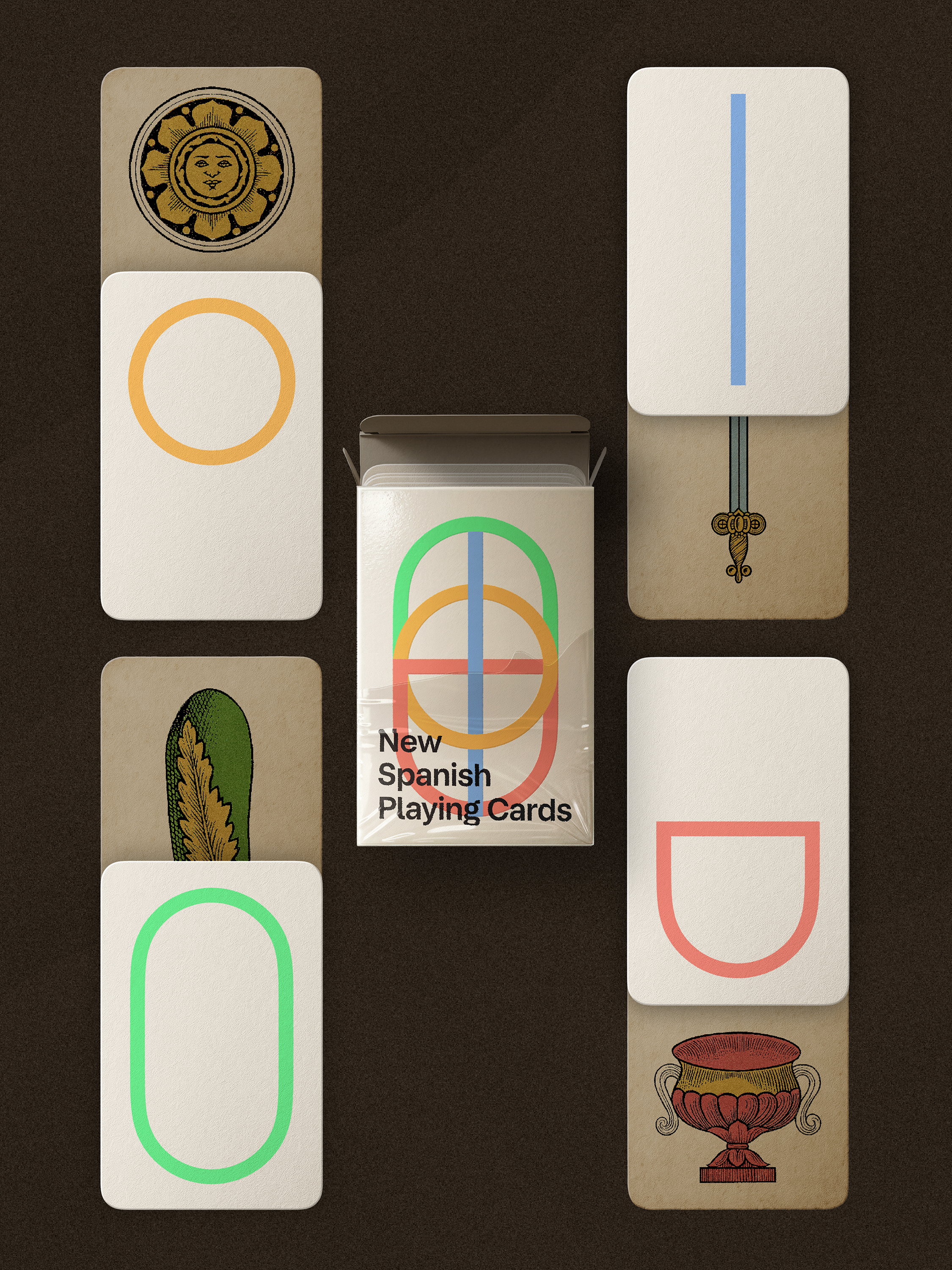 Collection of New Spanish Playing Cards with various symbols on a dark background