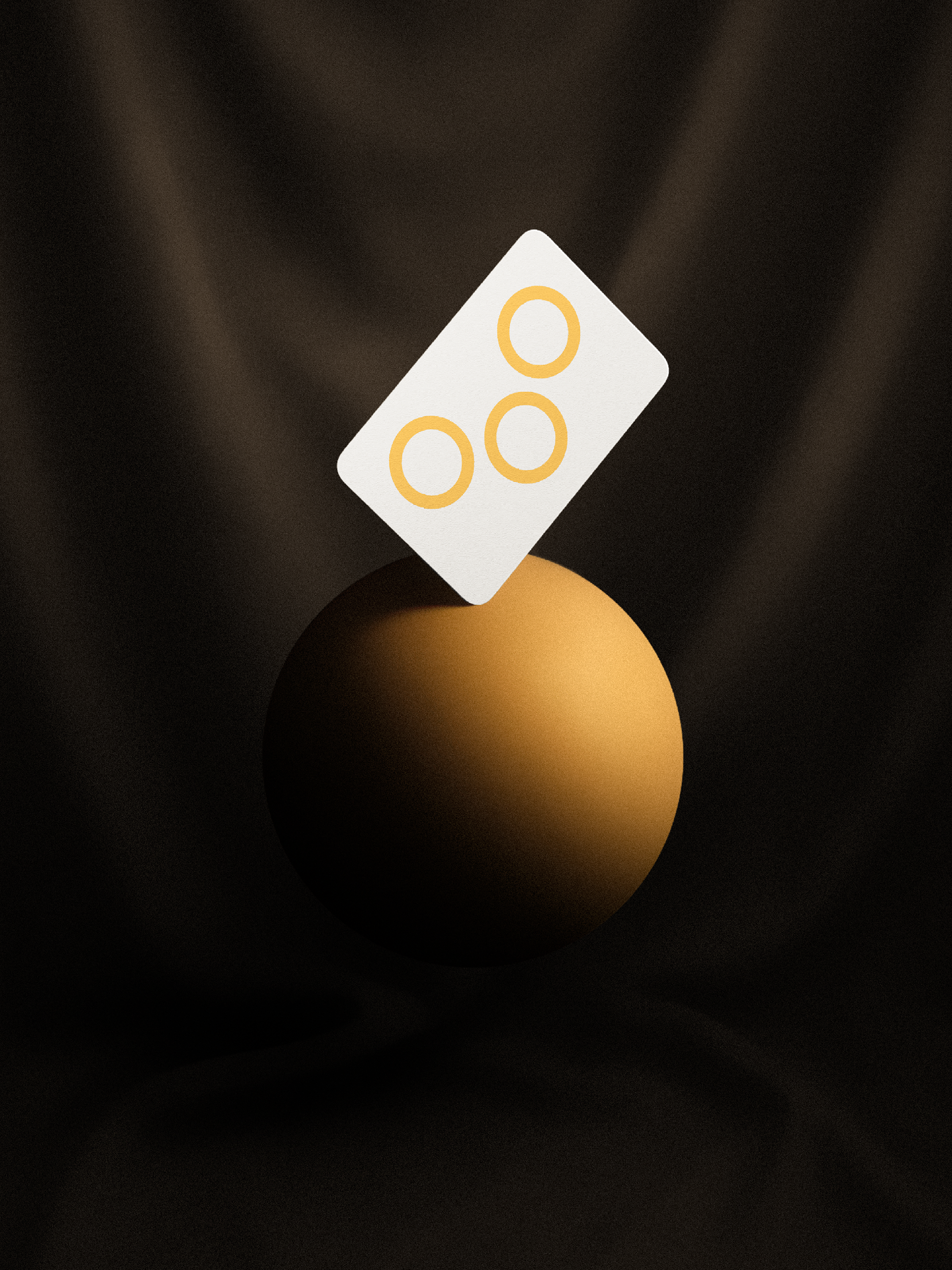 Card with three yellow circles on a brown sphere against a dark background