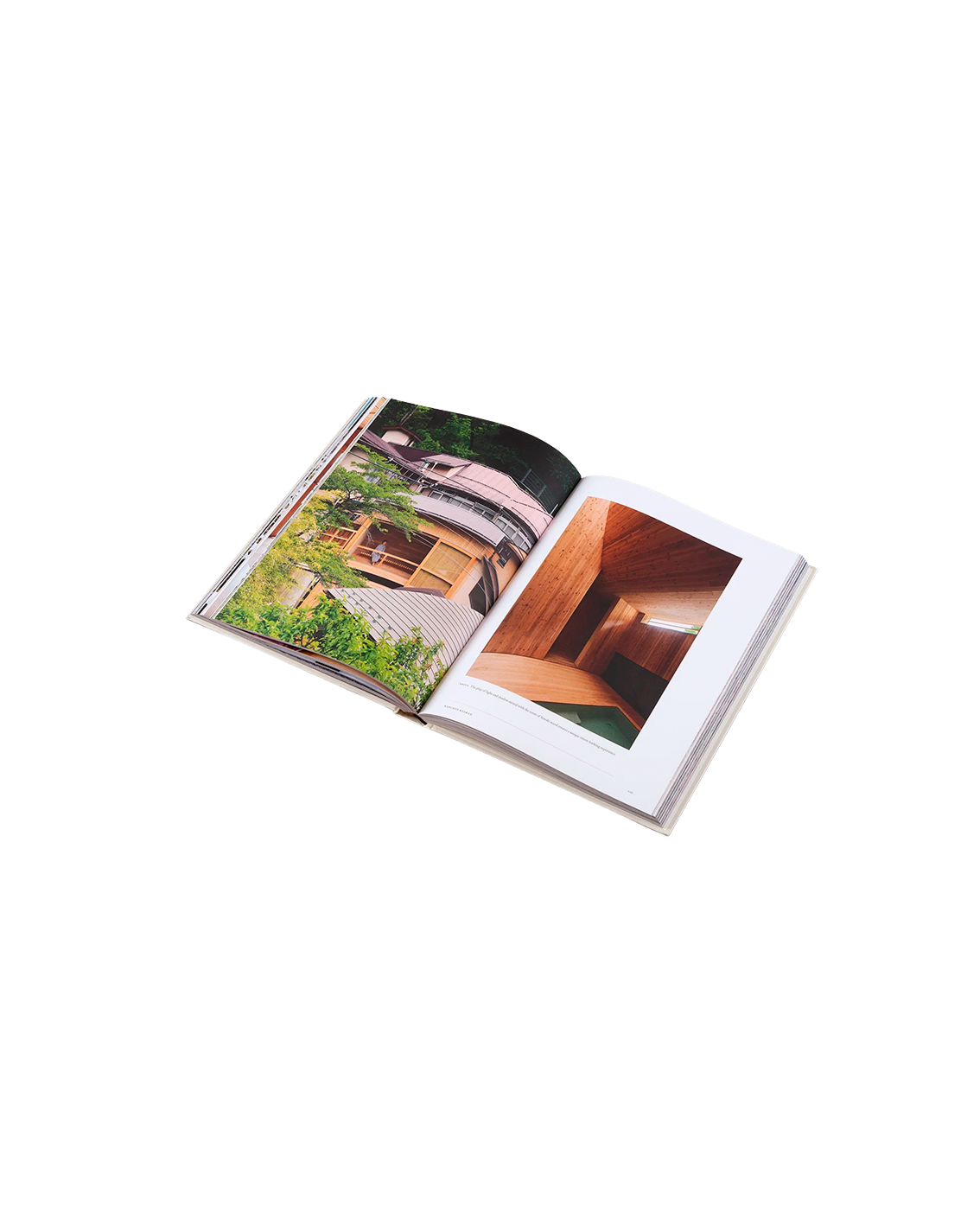Open book showing interior design images on a white background