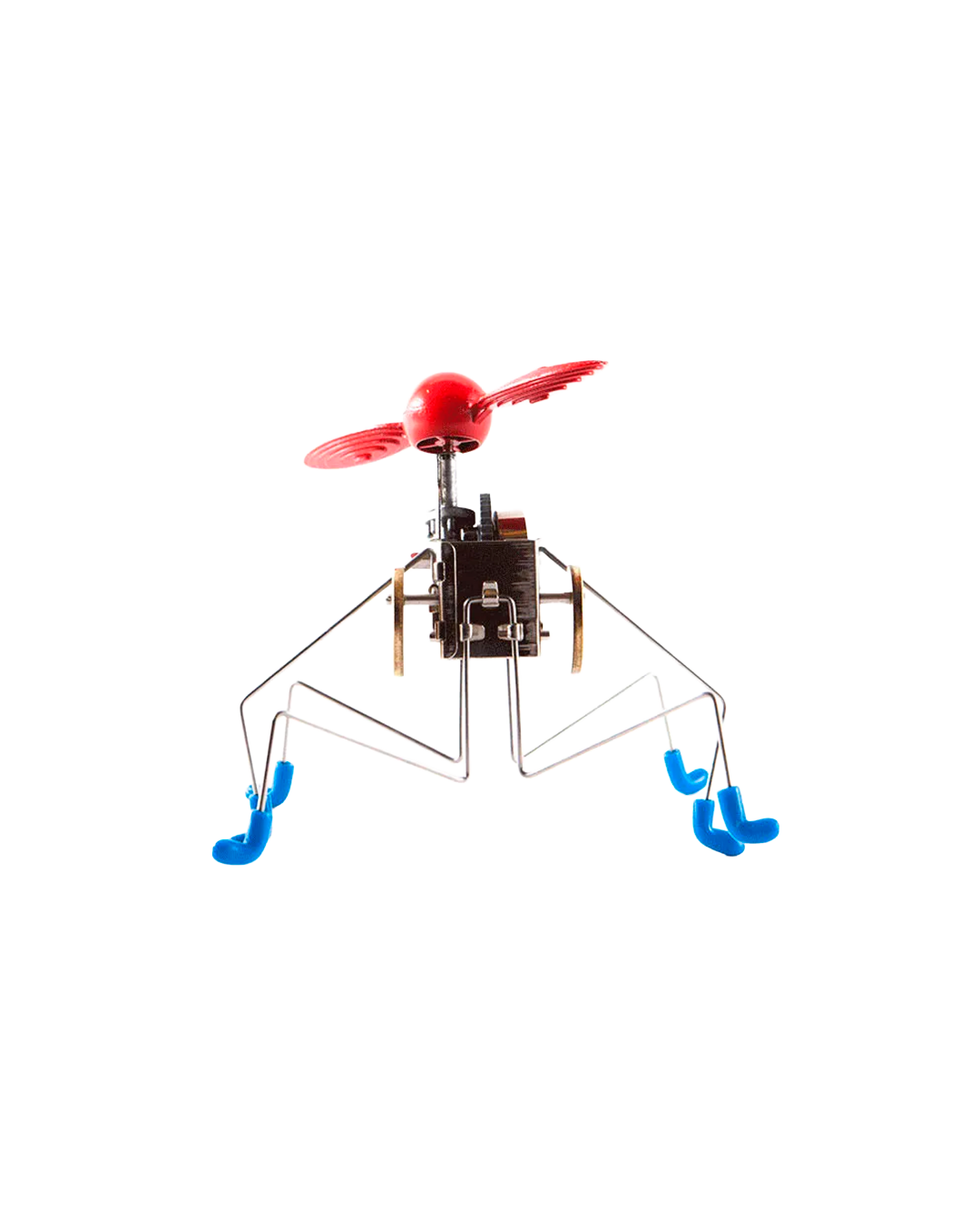 a wind-up toy with four legs and a red head
