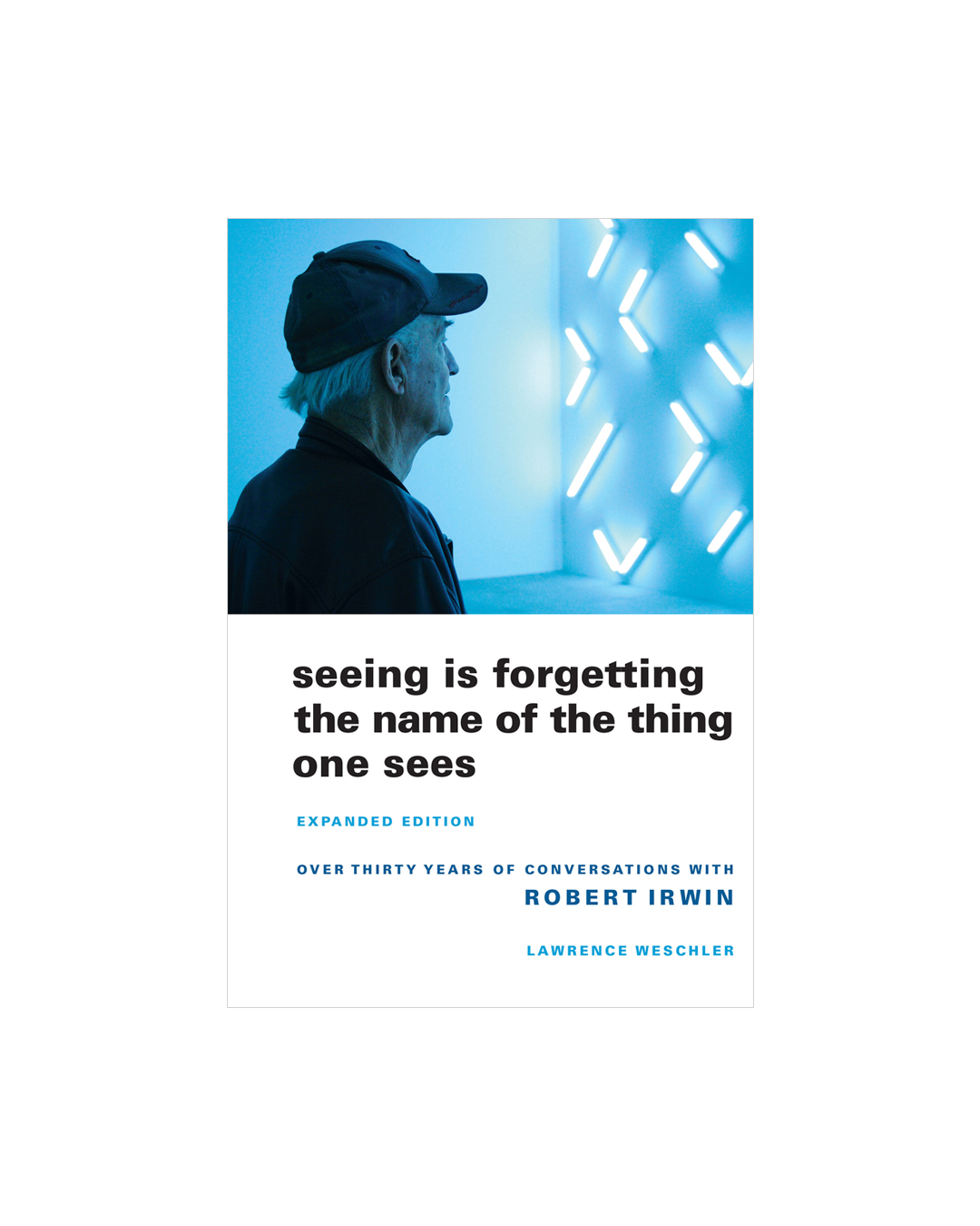 Book cover with a person wearing a cap and text 'seeing is forgetting the name of the thing one sees' on a white background.