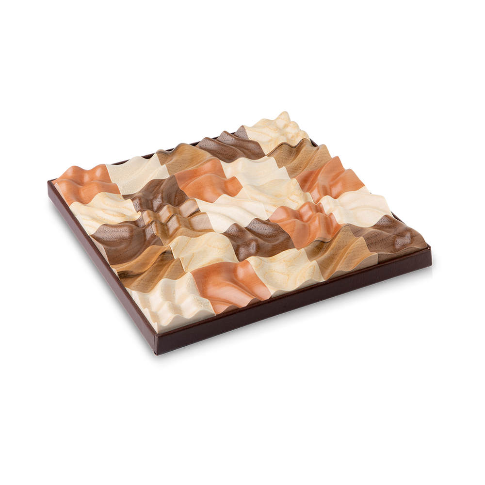 Truzzle - Handmade Three-Dimensional Wooden Puzzles.