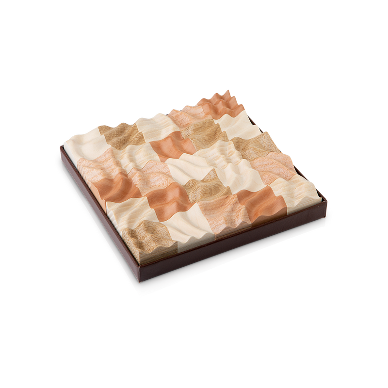 Truzzle - Handmade Three-Dimensional Wooden Puzzles.