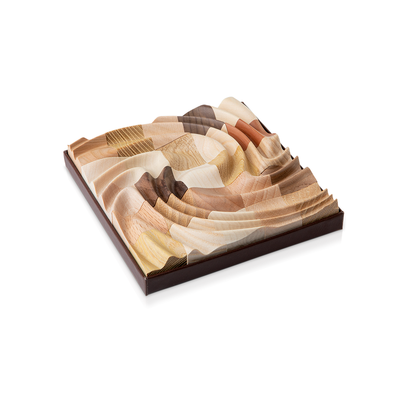 Truzzle - Handmade Three-Dimensional Wooden Puzzles.